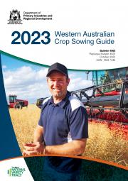 Cover of the 2023 WA Crop Sowing Guide showing Peter Cowan in his canola crop before harvest at Mt Walker