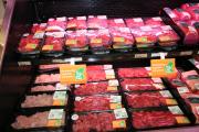 Buy West Eat Best logo on meat packs in supermarket meat cabinet.