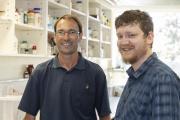 DPIRD Grains R&D Post Graduate Scholarship recipients Martin Harries and Andrew Phillips pictured in a laboratory