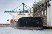 Grain being loaded into container ship at Esperance port in Western Australia