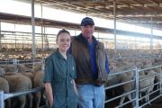 Two vets standing in a saleyard