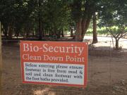 on-farm biosecurity signage at an orchard entrance