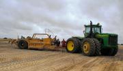Carry grader for clay spreading on water repellent soils