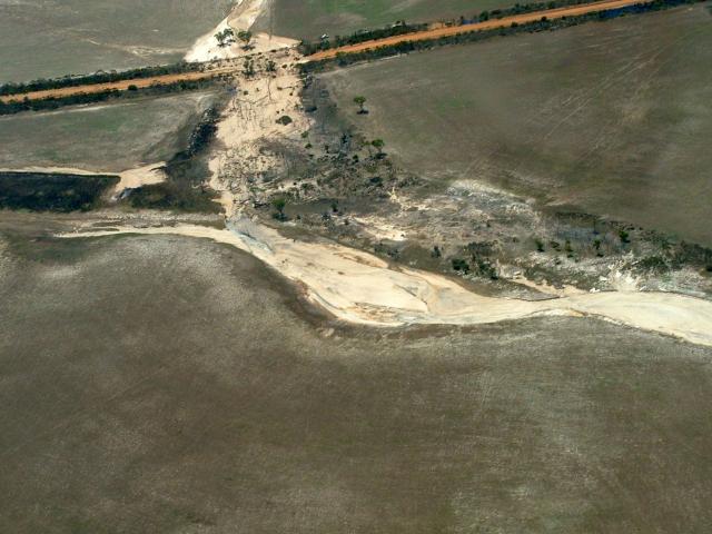 Photograph showing sheet, rill and gully water erosion