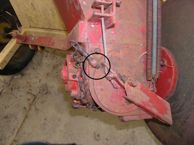 Close up image of port disc safety pin on bait layer