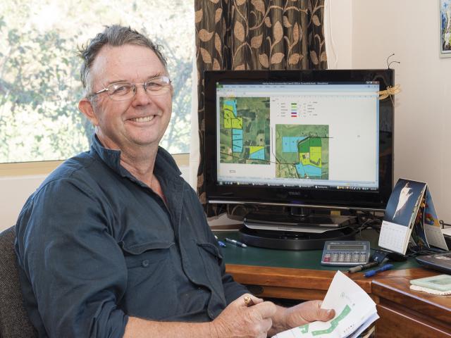 Alan Hawley at his computer