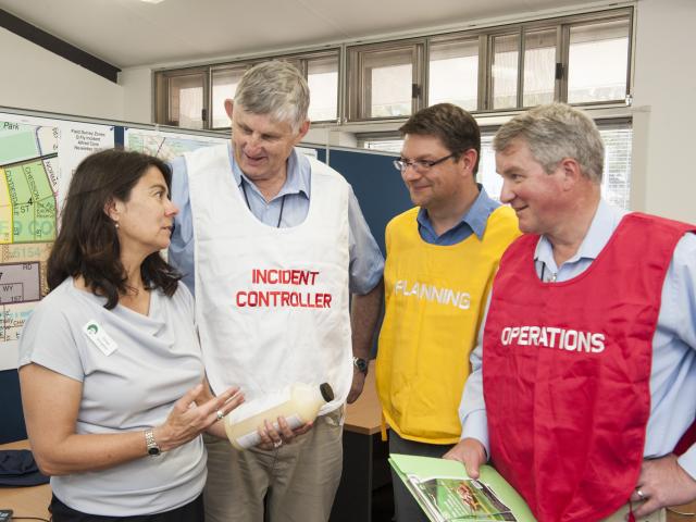DPIRD officers Sonya Broughton (left), Bill Trend, Vincent Lanoiselet and Dr Bruce Twentyman discuss strategies during the department’s Q-fly response.