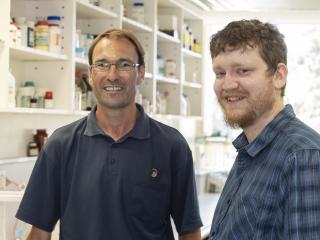 Martin Harries (left) and Andrew Phillips have each received a DPIRD Grains R&D Post Graduate Scholarships to explore solutions to Western Australian production issues. DPIRD Grains R&D Post Graduate Scholarship recipients Martin Harries and Andrew Phillips pictured in a laboratory