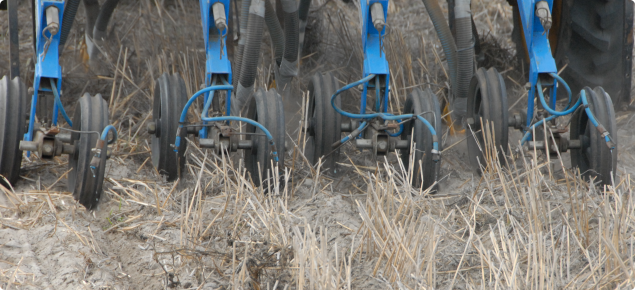 Soil wetting agent being banded onto furrows in water repellent sand using the DAFWA coneseeder