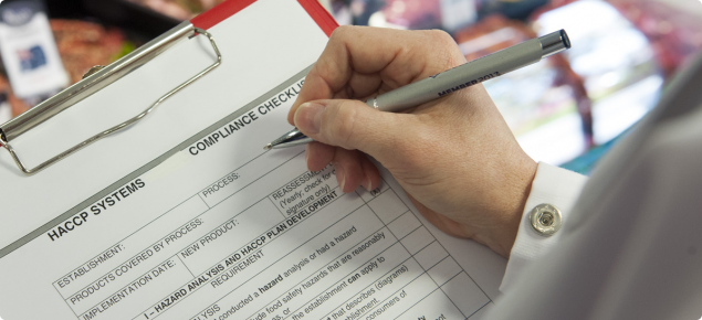 Person completing HACCP checklist