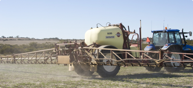 Boom sprayers are pulled by a tractor to spray large areas of land 