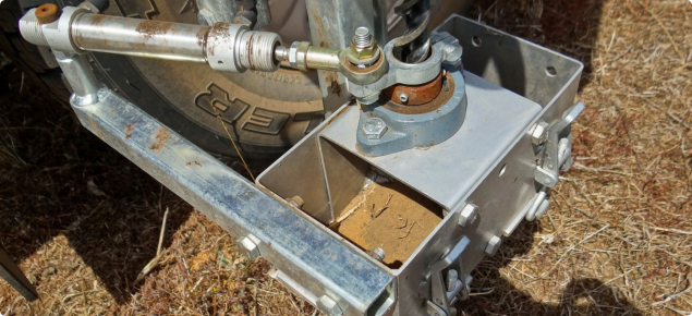 Close photograph of a mechanical Terrier soil sampler