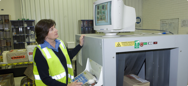 Quarantine inspectors use x-ray to inspect mail parcels entering WA