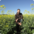 Martin Harries in a paddock of canola sown in wide rows