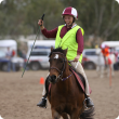 Child on pony taking part in a horse event