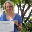 Department of Agriculture and Food research officer Dominie Wright displays a certificate of recognition from the IPPC for her work as lead author on the global Karnal bunt protocol.