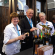 Department of Agriculture and Food Director General Rob Delane (centre) with Mary and Trevor Dickinson, of Dickinson Estate in Boyup Brook, at the Hong Kong International Wine and Spirits Fair.